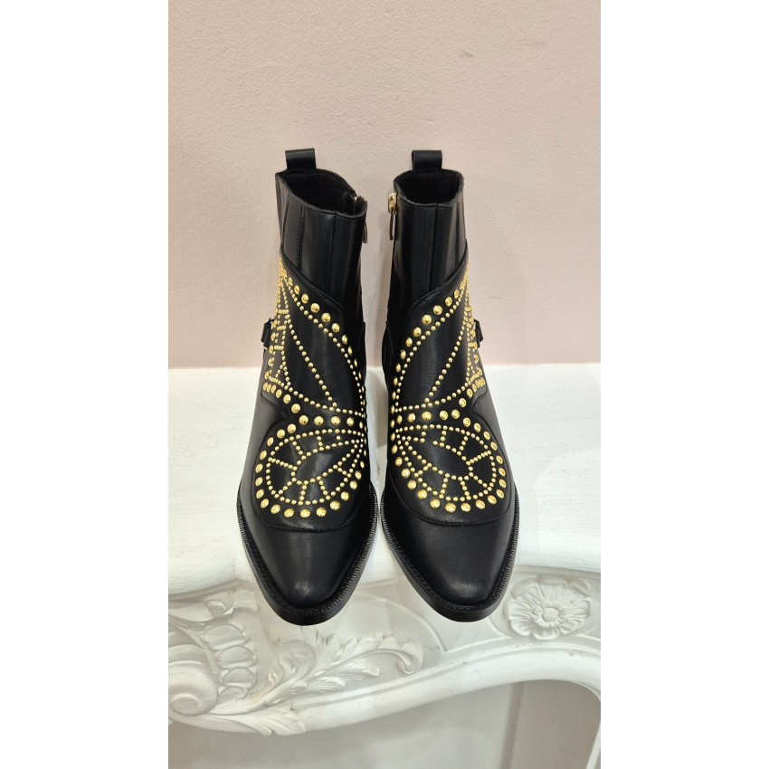 BOTÍN PIEL NEGRO MARIPOSA Y TACHAS